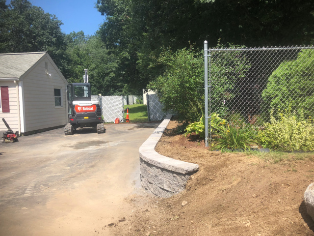 Hardscape wall with drainage and Landscaping